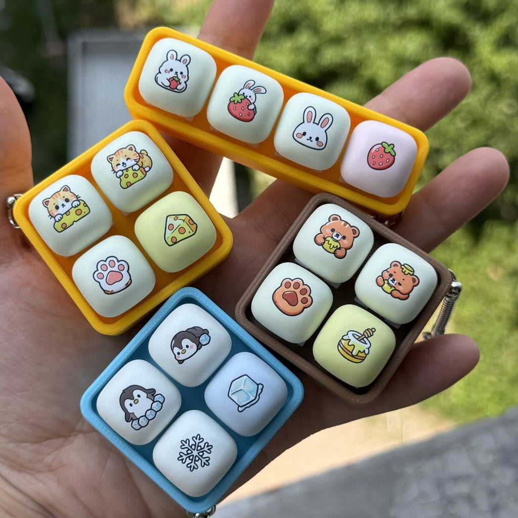 Hand holding animal tray 4-key keycap clicker keychains