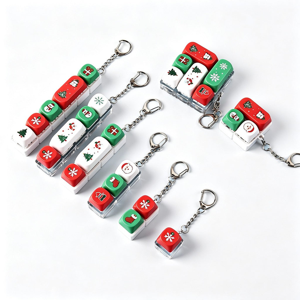 Christmas keycap clicker keychains on a white background
