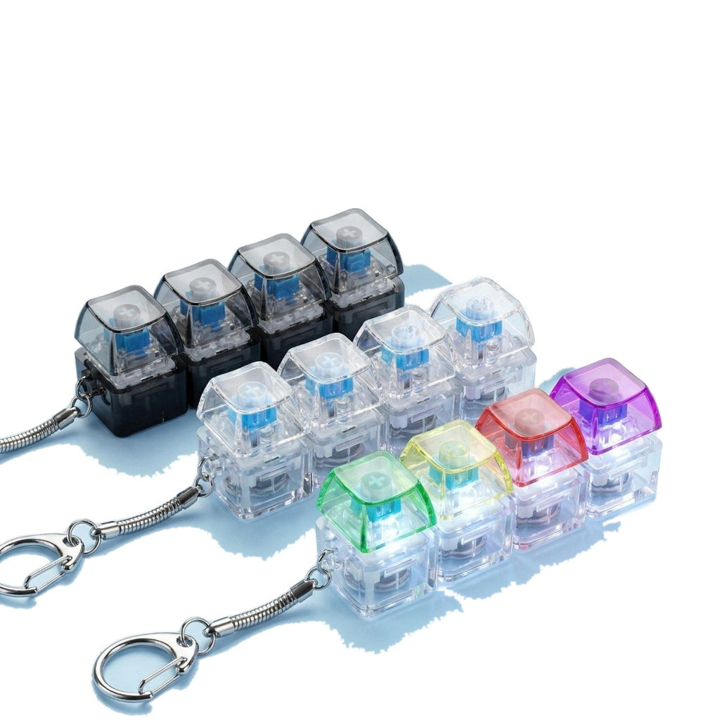 Translucent 4-key keycap clicker keychains in black, white and pink