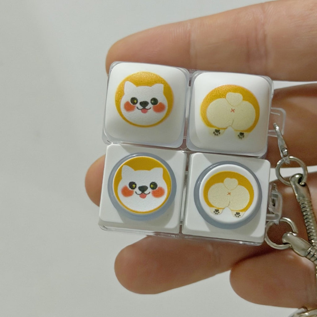 Two corgi 2-key keycap clicker keychains
