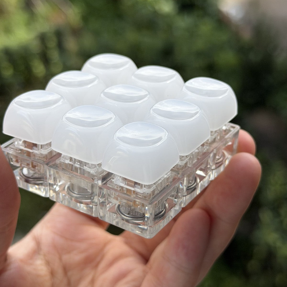 Top view of a frosted jade-look 9-key keycap clicker