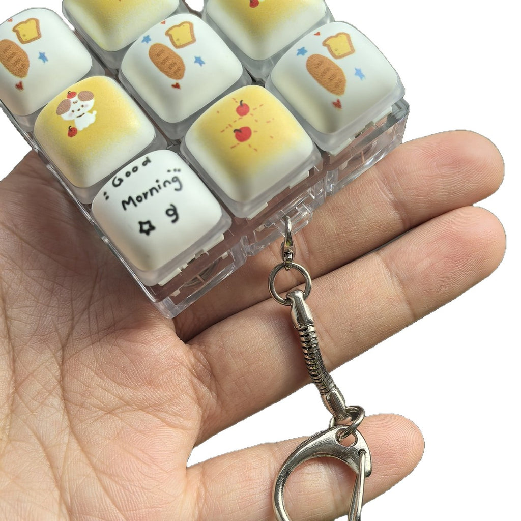Close-up of the Good Morning bread 9-key keycap clicker