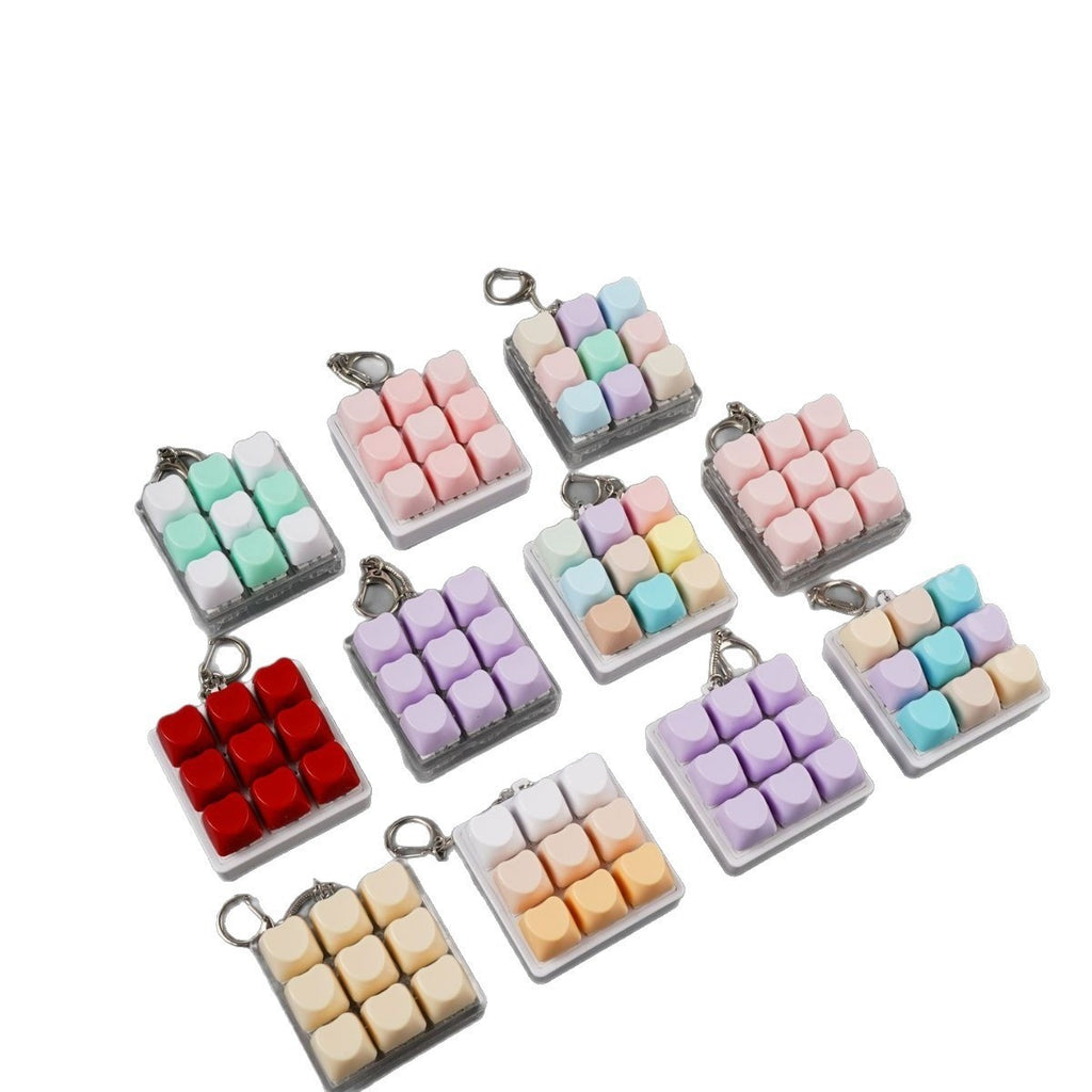 Heart keycap clicker keychains in assorted colours and layouts
