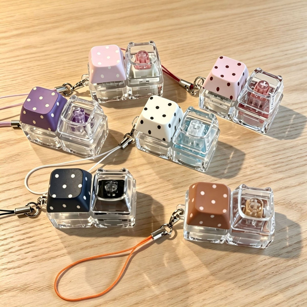 Polka-dot cat-head 2-key keycap clicker keychains in black, white, pink, purple and brown