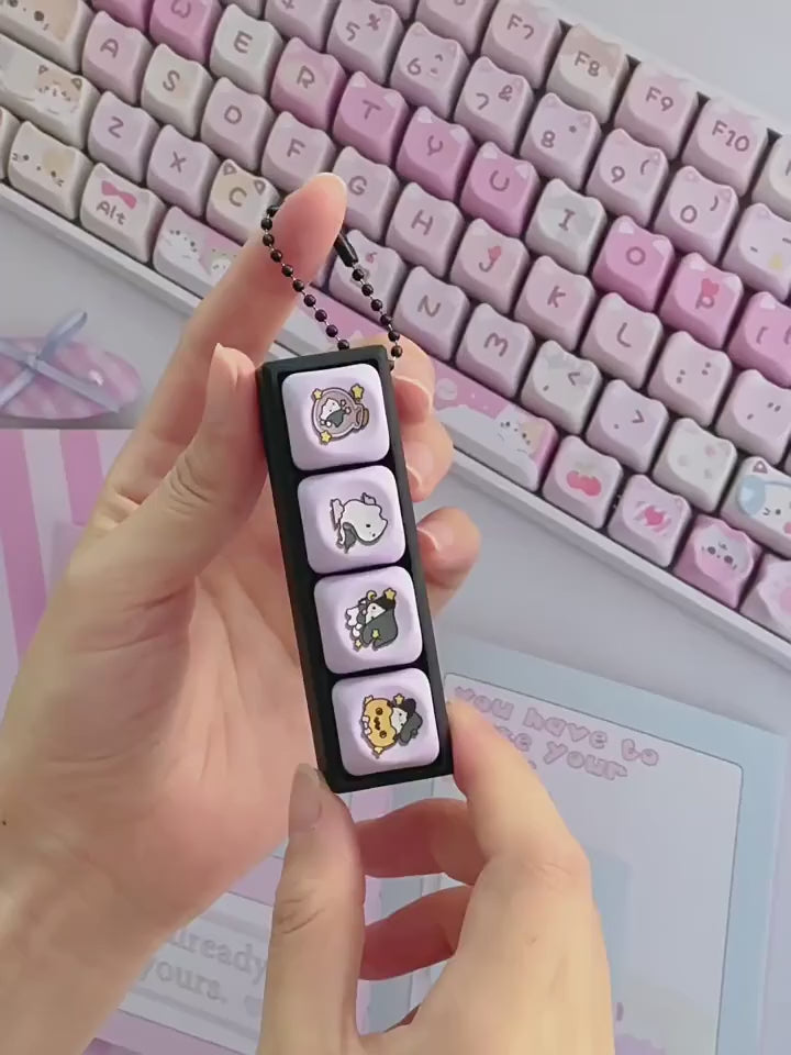 Video of the magic cat keycap clicker keychain being clicked by hand