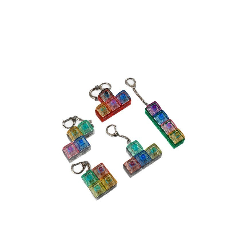 Translucent puzzle-block 4-key keycap clicker keychains in T, L, Z and square shapes
