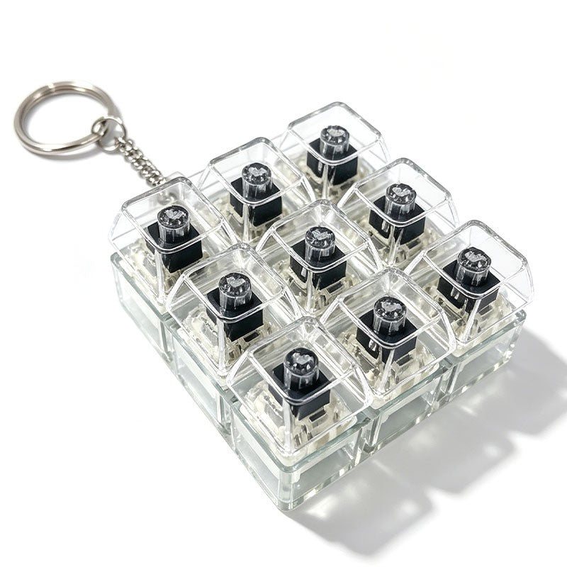 Quiet Switch keycap clicker keychain, 9-Key Peach