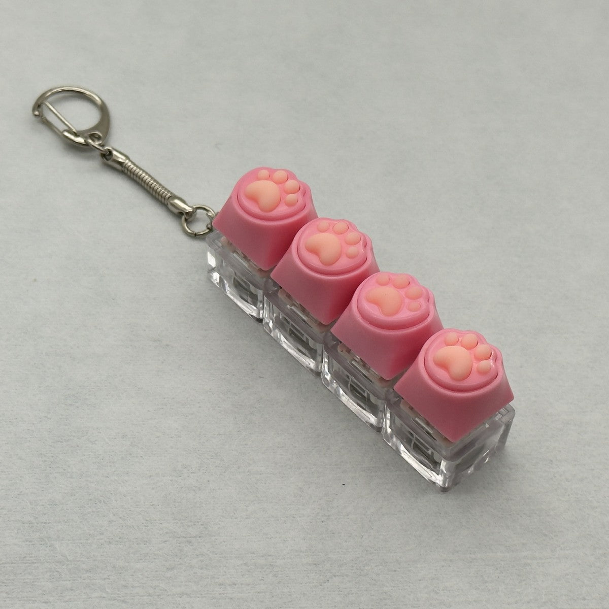 Silicone Cat Paw 4-Key keycap clicker keychain, Pink