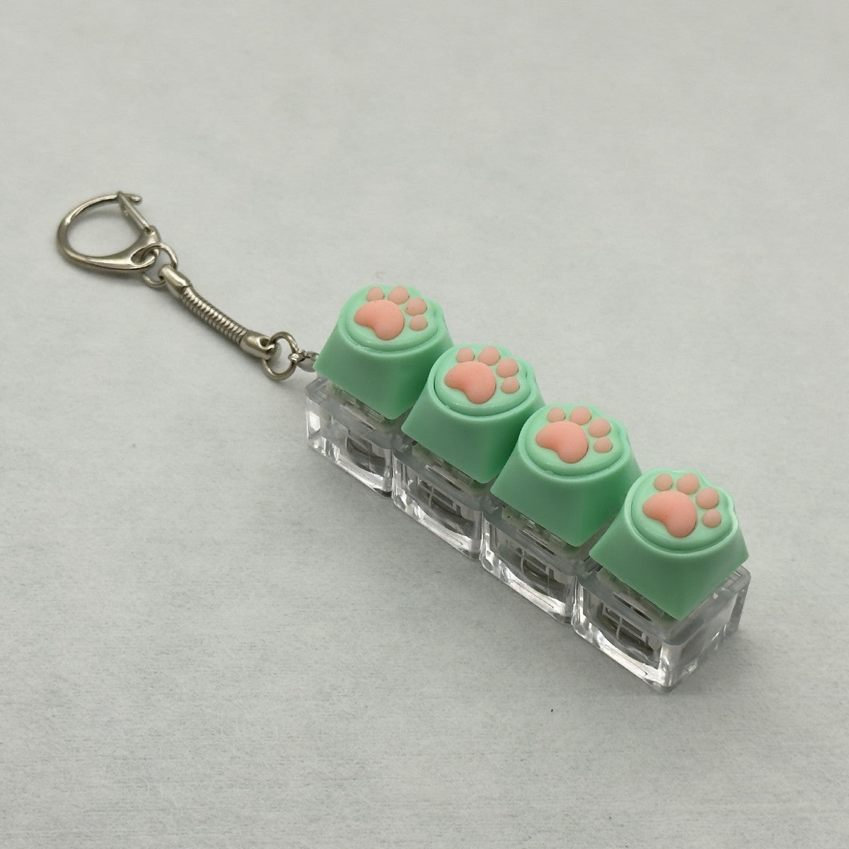 Silicone Cat Paw 4-Key keycap clicker keychain, Light Green