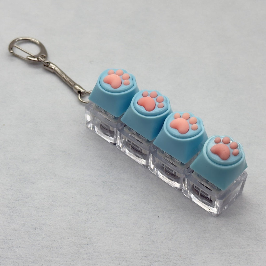 Silicone Cat Paw 4-Key keycap clicker keychain, Light Blue