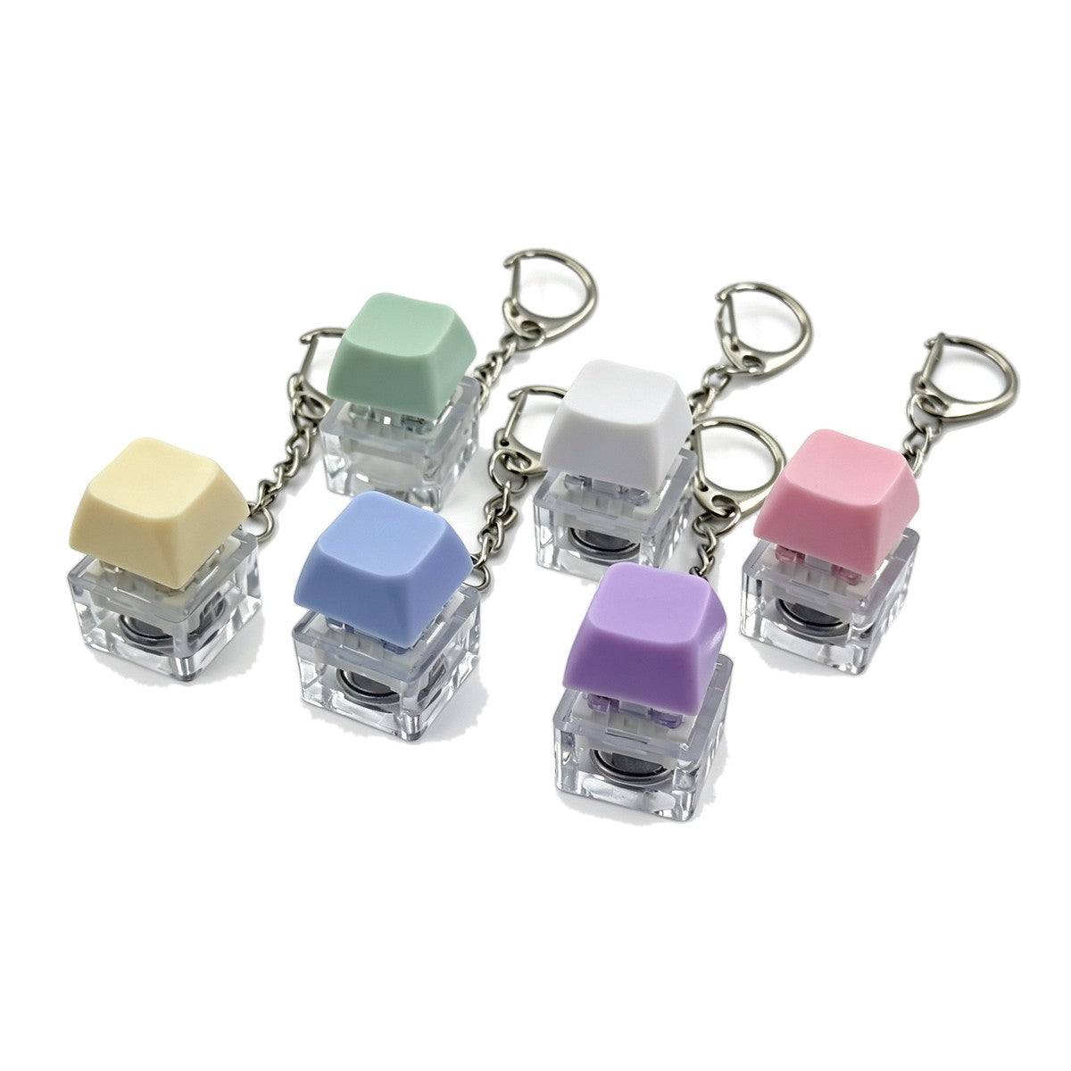 Single-key macaron keycap clicker keychains in assorted colours
