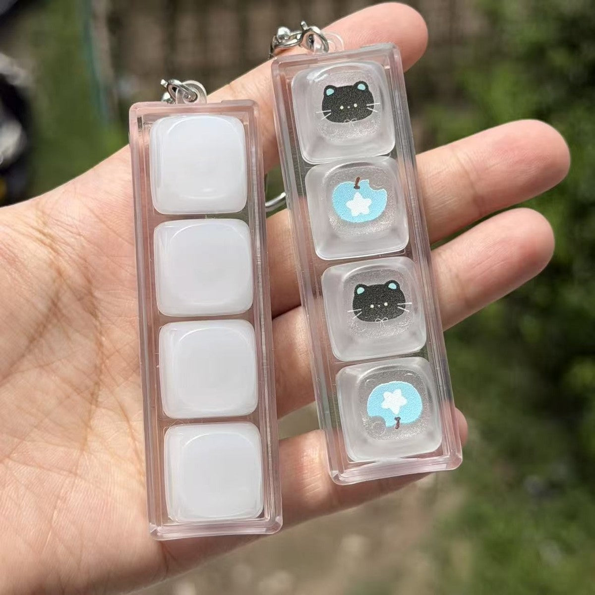 Translucent Cat 4-Key keycap clicker keychain, view 1