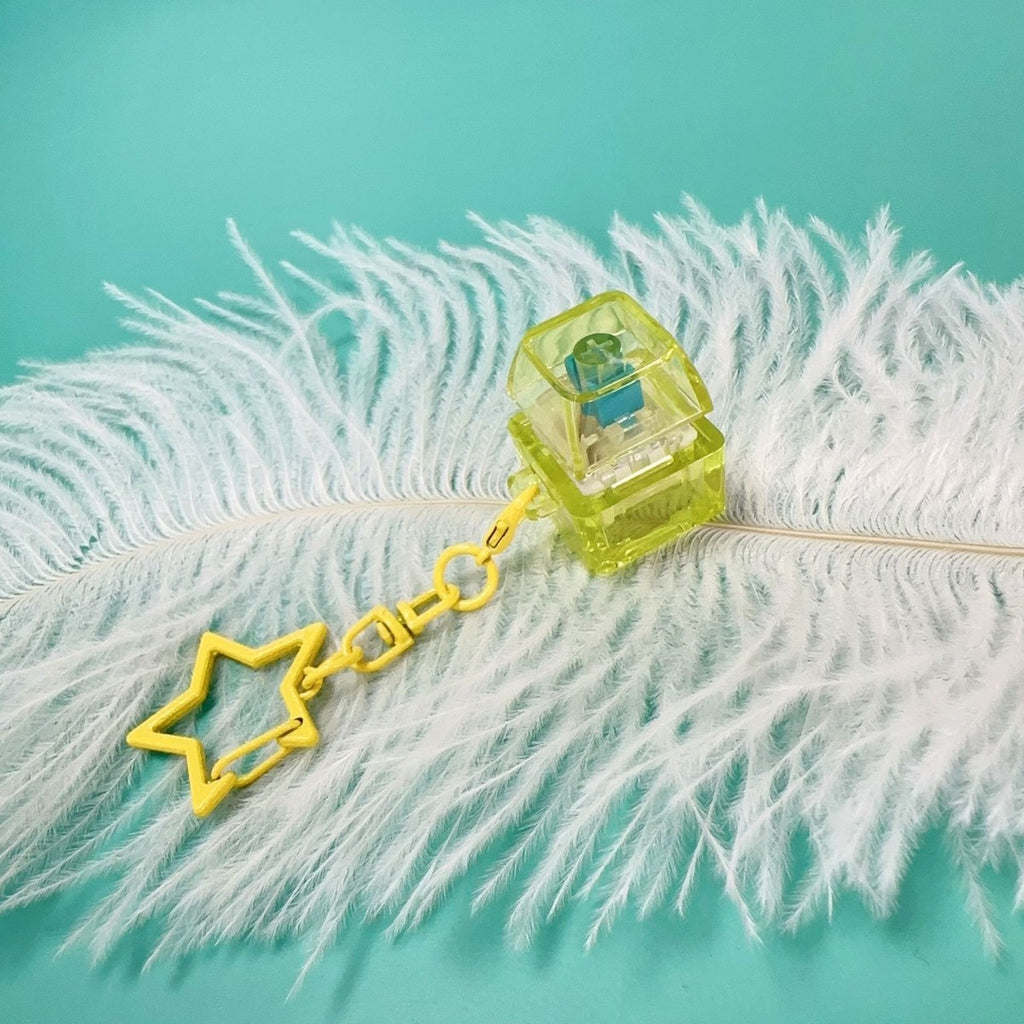 Yellow translucent PC keycap clicker keychain with star chain